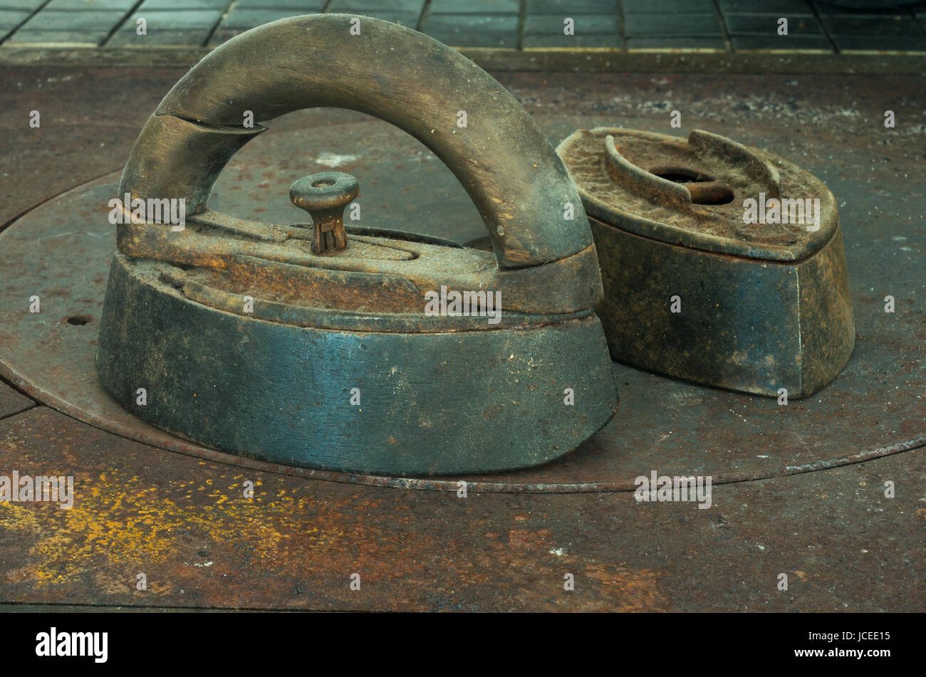 Old Irons on stove Stock Photo Alamy