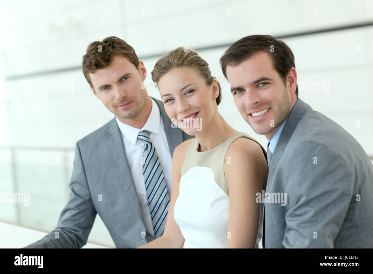 Portrait of smiling business team Stock Photo - Alamy