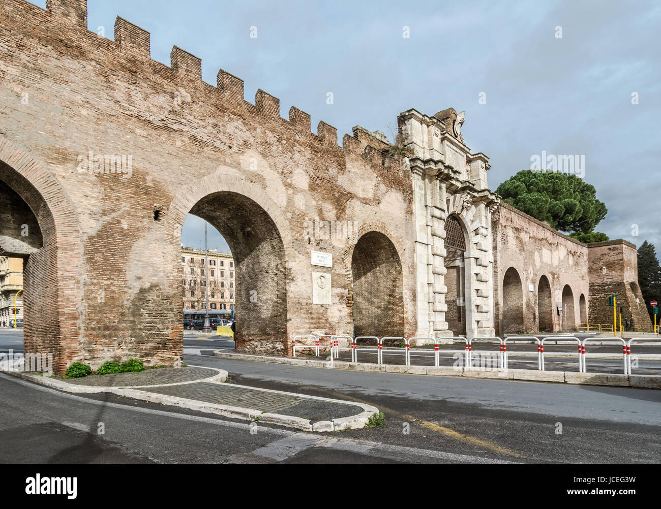 Porta San Giovanni is a gate in the Aurelian Wall of Rome, spanning piazzale Appio; a 'modern' door that pope Gregory XIII had built in 1574 by Michelangelo's apprentices, Jacopo (Giacomo) Del Duca. Stock Photo