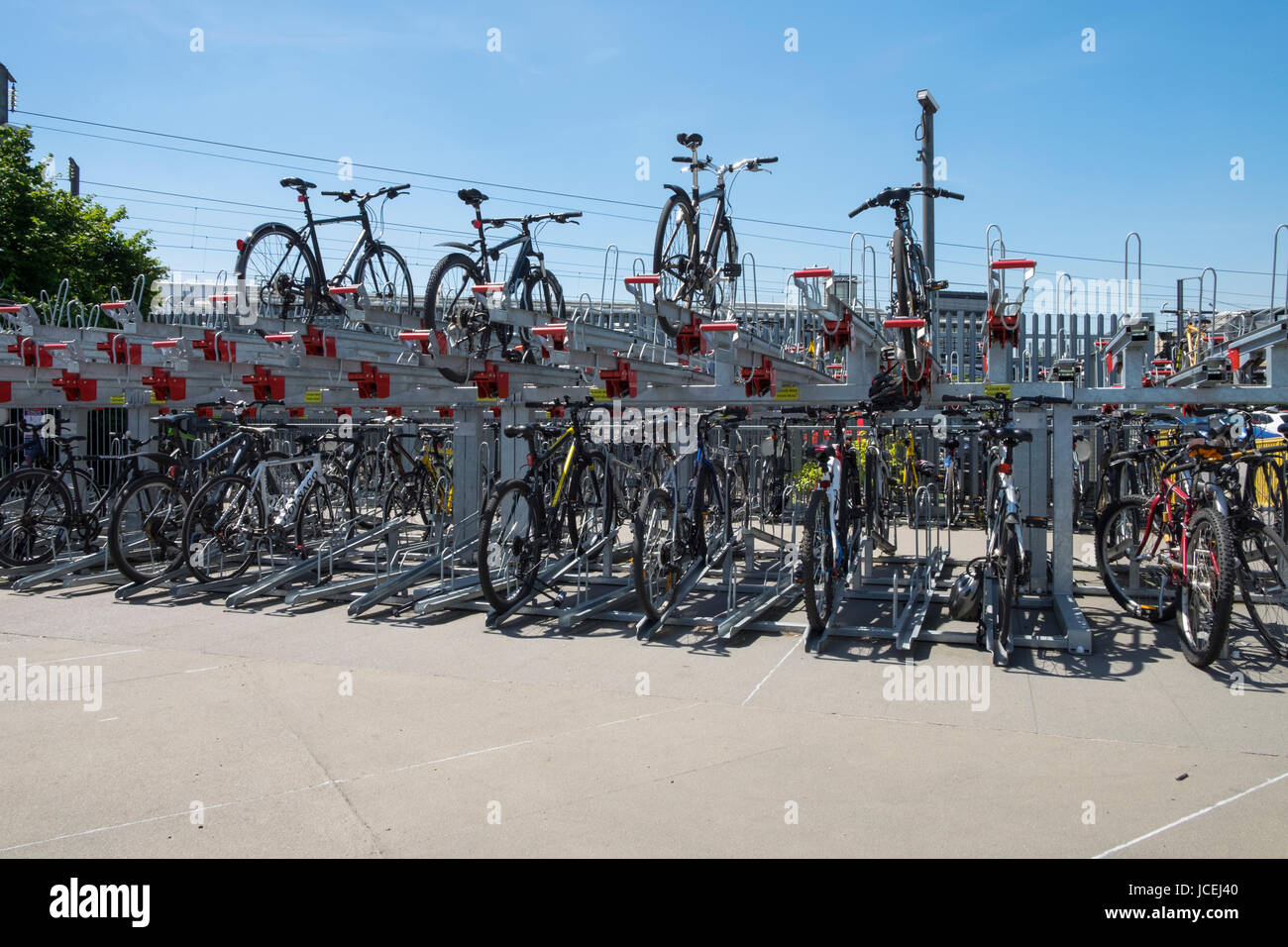 Secure bike parking train station hires stock photography and images