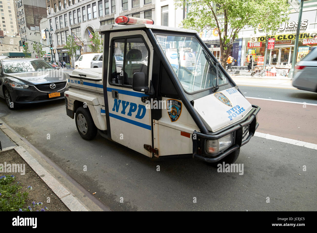 nypd police patrol go-4 interceptor three wheeled vehicle New York City USA Stock Photo
