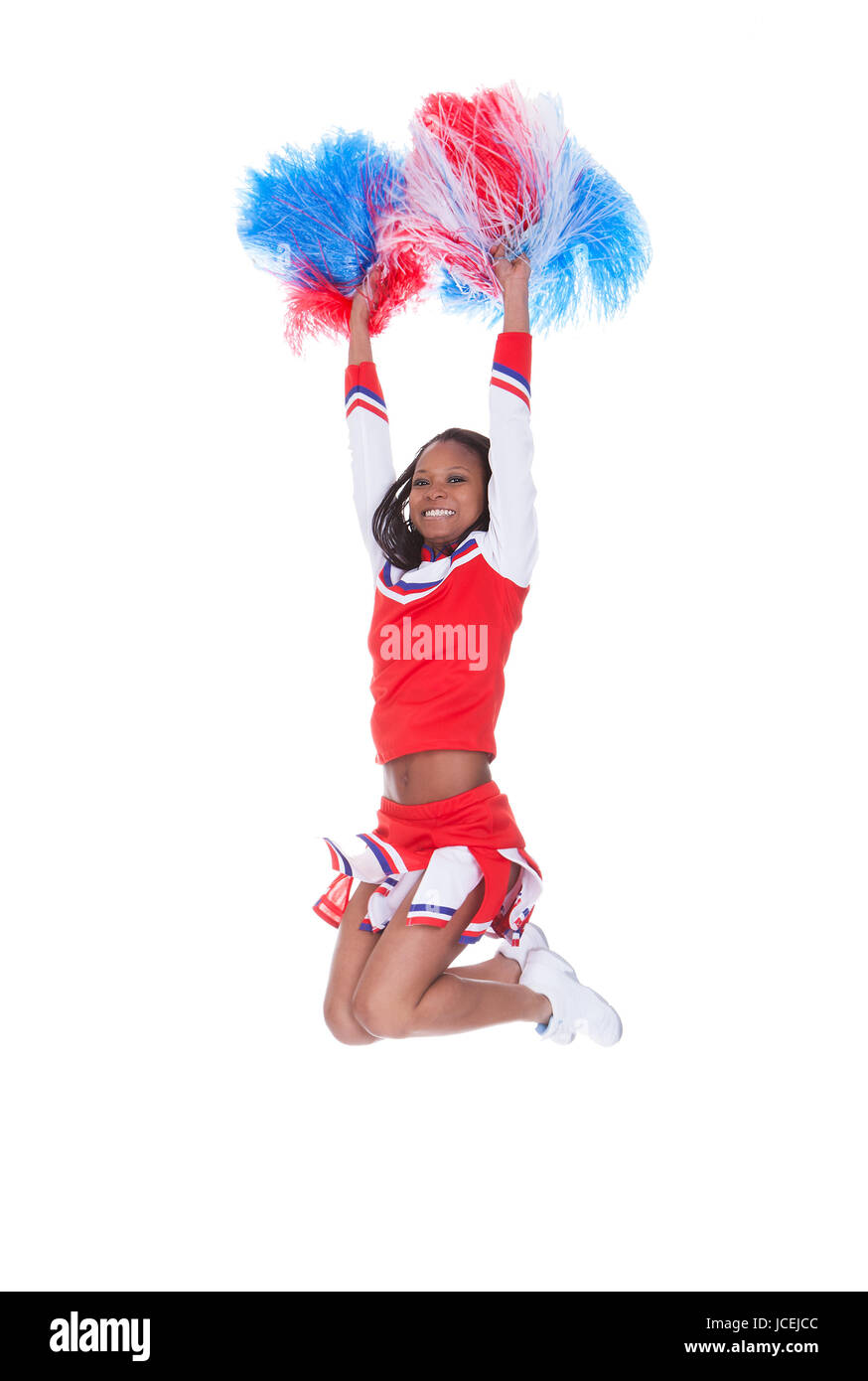 Smiling Beautiful Cheerleader With Pompoms. Isolated On White Stock ...