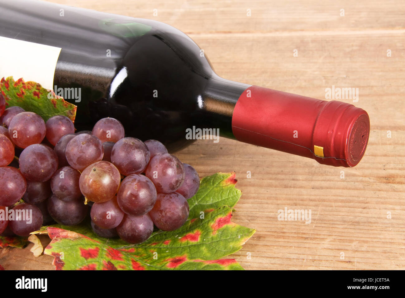 red wine with grapes Stock Photo