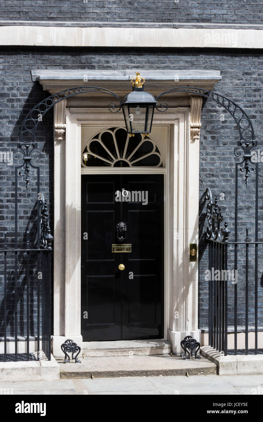 Black front door of No 10 Downing Street, Whitehall, London. The seat of the British Prime Minister Stock Photo
