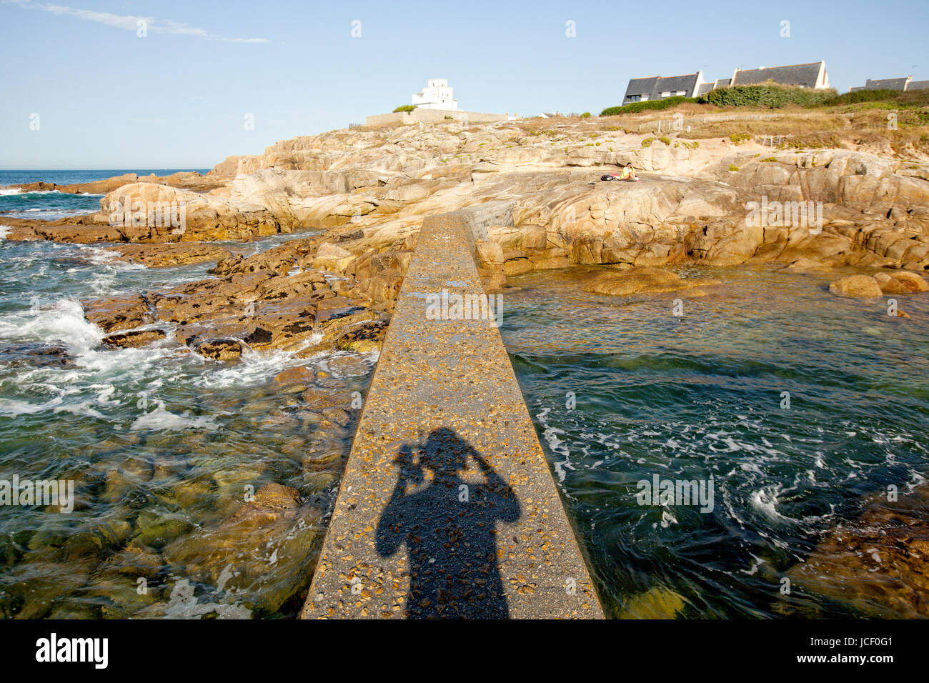 On a rocky headland, locality Le Courégant, in front of the Ile de Groix. Stock Photo