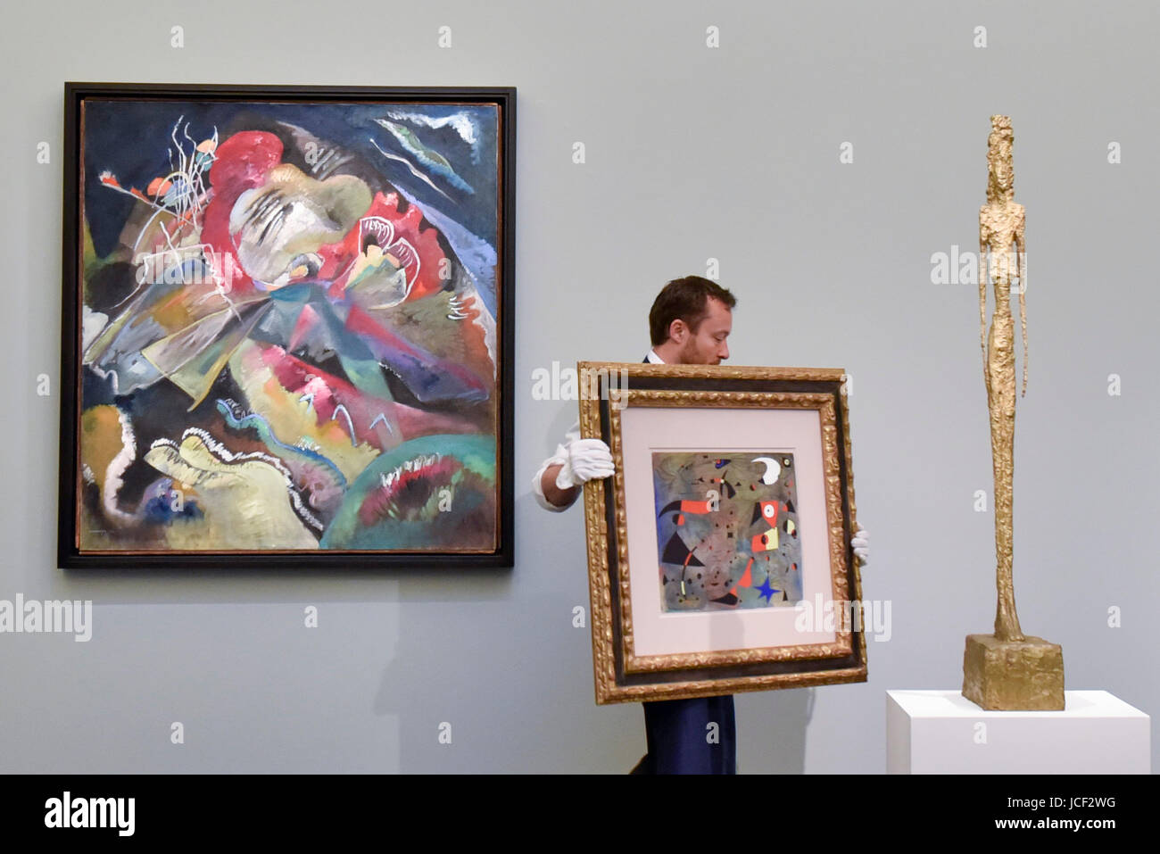 London, UK.  15 June 2017. (L to R) 'Bild mit weissen Linien', 1913, by Wassily Kandinsky (estimate on request), 'Femme et oiseaux', 1940, by Joan Miró (estimate on request) and 'Grande figure', 1947, by Alberto Giacometti (estimate GBP15-25m). Preview of Impressionist and Modern art sale, taking place at Sotheby's New Bond Street on 21 June. Credit: Stephen Chung / Alamy Live News Stock Photo