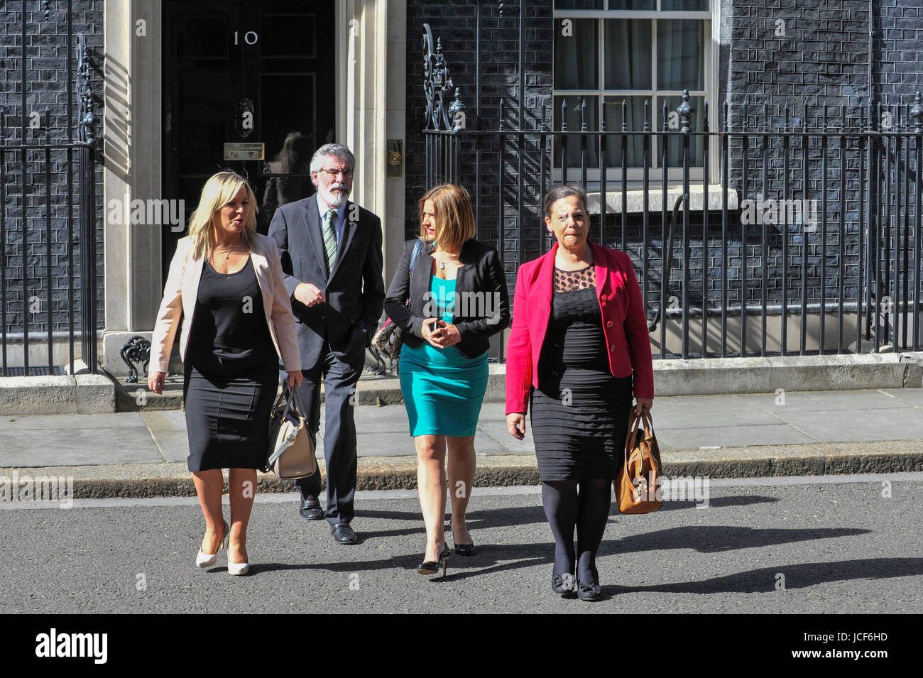 London, UK. 15th June, 2017. (L to R) Michelle O'Neill, leader of Sinn Féin, Gerry Adams, President, Mary Lou McDonald and Elisha McCallion exit Number 10. Members of the Northern Ireland Assembly visit Downing Street for talks with Prime Minister Theresa May following the results of the General Election. The Conservatives are seeking to work with the Democratic Unionist Party in order to form a minority government. Credit: Stephen Chung/Alamy Live News Stock Photo
