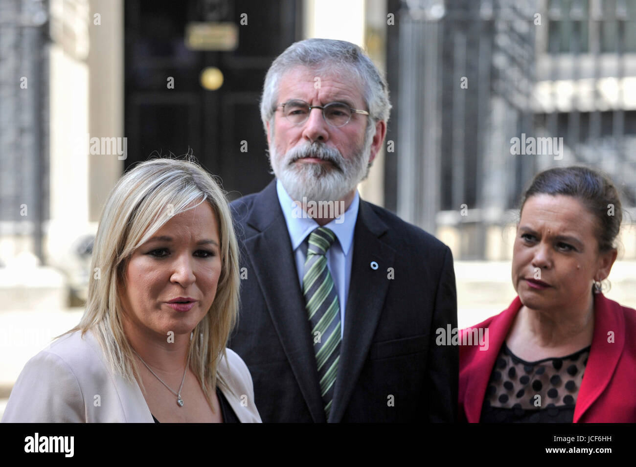 London, UK. 15th June, 2017. (L to R) Michelle O'Neill, leader of Sinn Féin, Gerry Adams, President, and Mary Lou McDonald give a press conference outside Number 10. Members of the Northern Ireland Assembly visit Downing Street for talks with Prime Minister Theresa May following the results of the General Election. The Conservatives are seeking to work with the Democratic Unionist Party in order to form a minority government. Credit: Stephen Chung/Alamy Live News Stock Photo