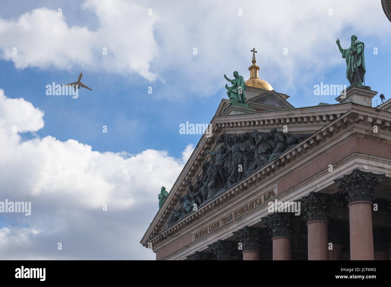 ST. PETERSBURG, RUSSIA - MAY 09, 2017: Isaac cathedral and Military aviation TU-134 in sky in a parade, celebration of 72 anniv Victory day on WWII Stock Photo