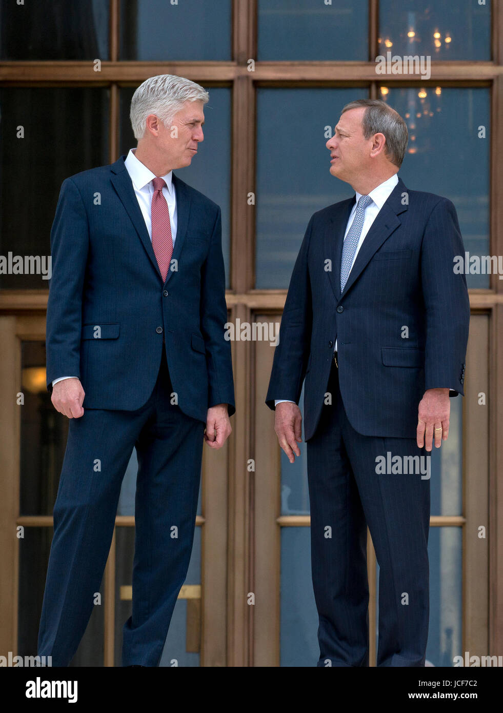 Chief Justice of the United States John G. Roberts, Jr., right, and ...