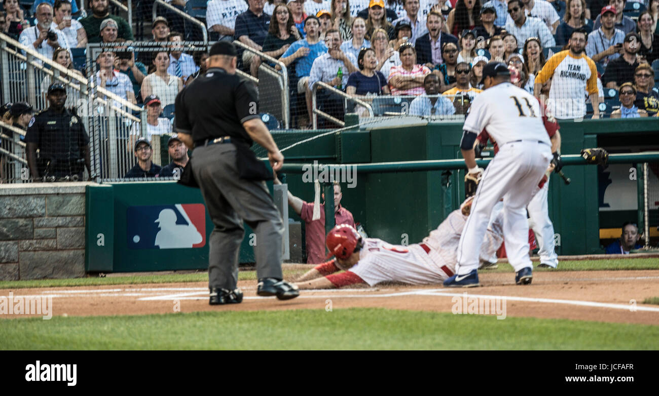 Since 1909, Members, both Democrat and Republican of the US House of Representatives and the US Senate have played in the annual Congressional Baseball game, with the money raised from ticket sales, donated to local charities.. This year, both teams played to honor House Majority Whip, Steve Scalise, R-LA who was shot during a practice session. Stock Photo