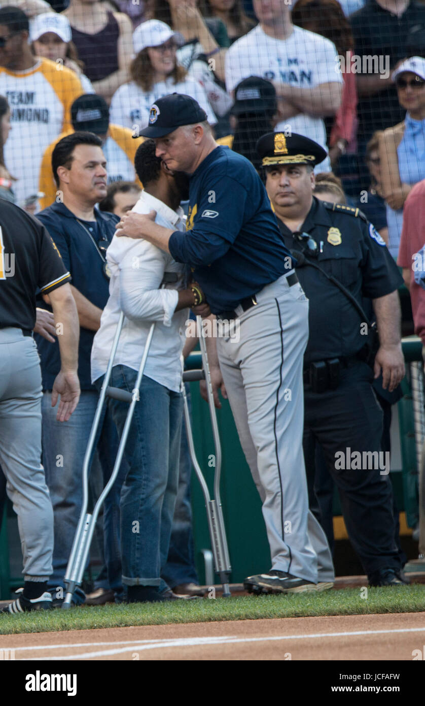 Since 1909, Members, both Democrat and Republican of the US House of Representatives and the US Senate have played in the annual Congressional Baseball game, with the money raised from ticket sales, donated to local charities.. This year, both teams played to honor House Majority Whip, Steve Scalise, R-LA who was shot during a practice session. Stock Photo