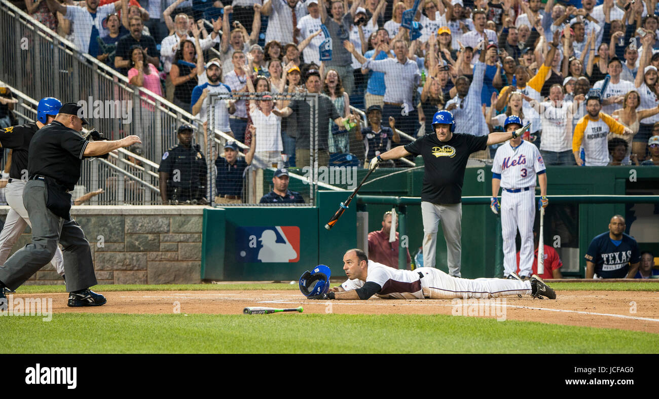 Since 1909, Members, both Democrat and Republican of the US House of Representatives and the US Senate have played in the annual Congressional Baseball game, with the money raised from ticket sales, donated to local charities.. This year, both teams played to honor House Majority Whip, Steve Scalise, R-LA who was shot during a practice session. Stock Photo