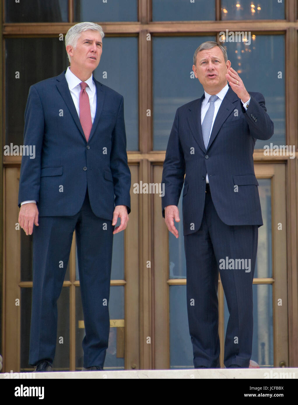 Chief Justice of the United States John G. Roberts, Jr., right, and ...