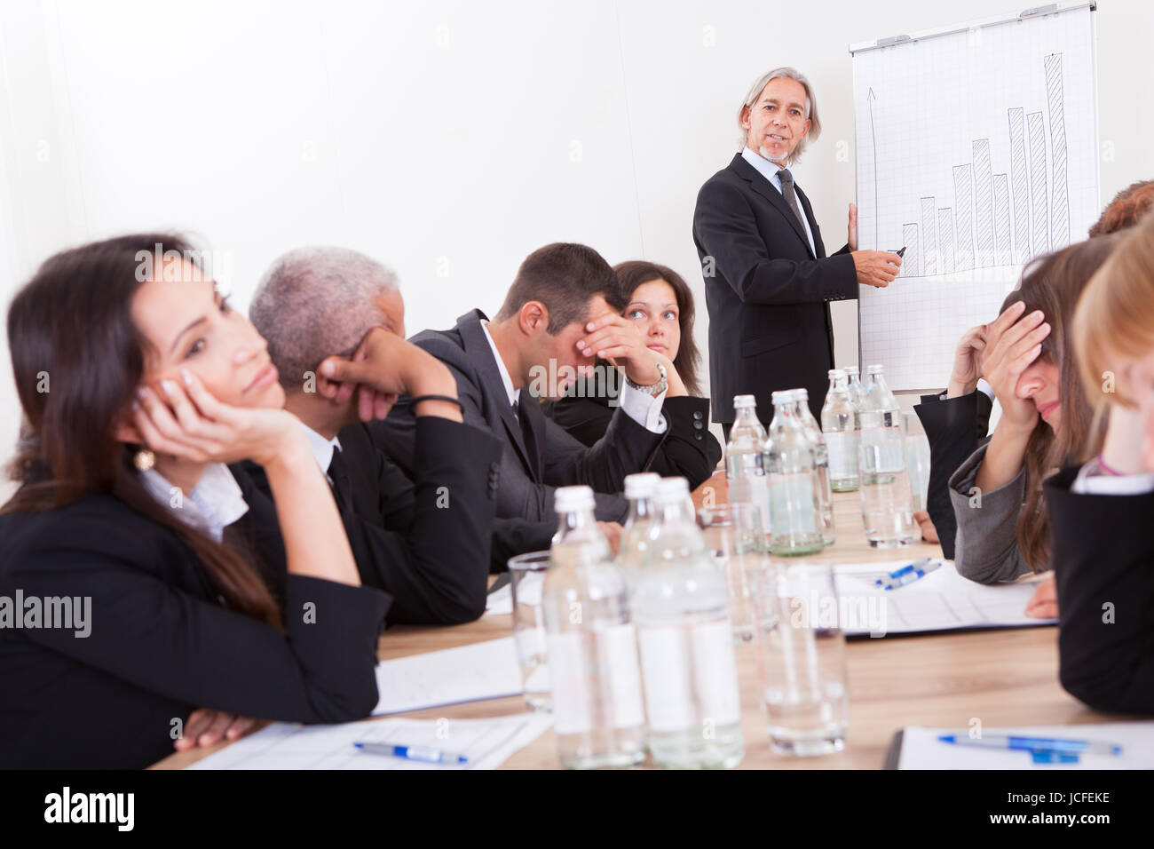 Photo Of Sad Business Team Attending The Seminar Stock Photo Alamy