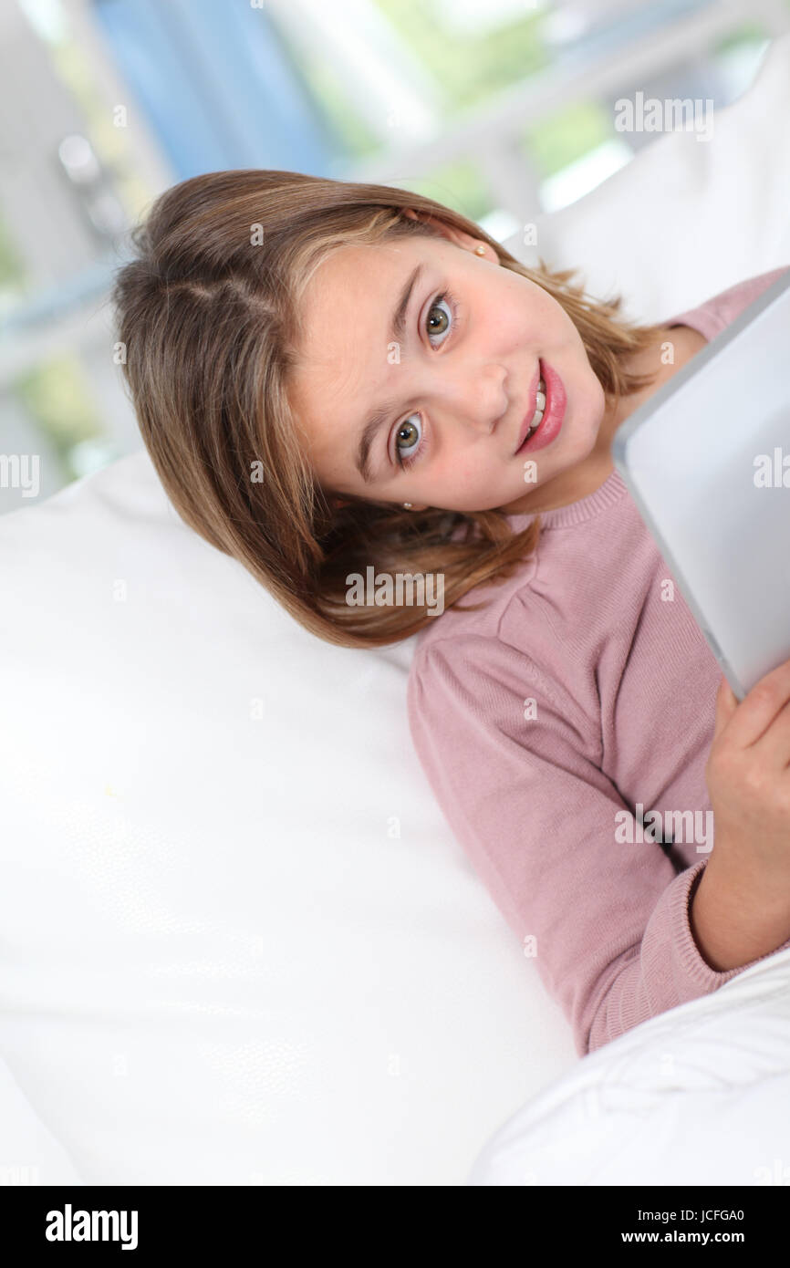 Little Girl Crying Using Tablet Portrait of little girl using electronic tablet Stock Photo - Alamy
