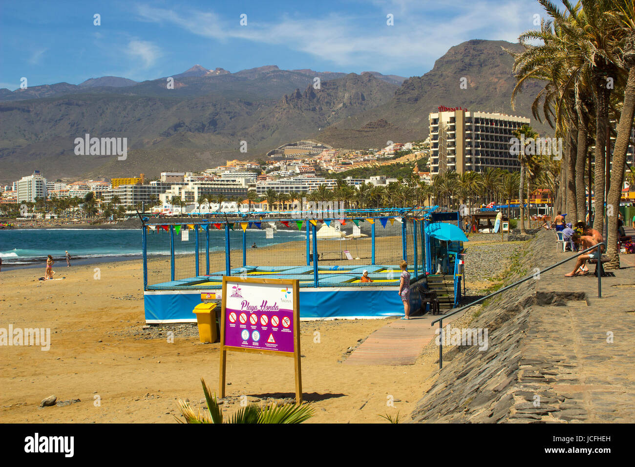 The sandy bay at Playa Las Americas in Teneriffe in the Spanish Canary islands on a hot sunny day Stock Photo