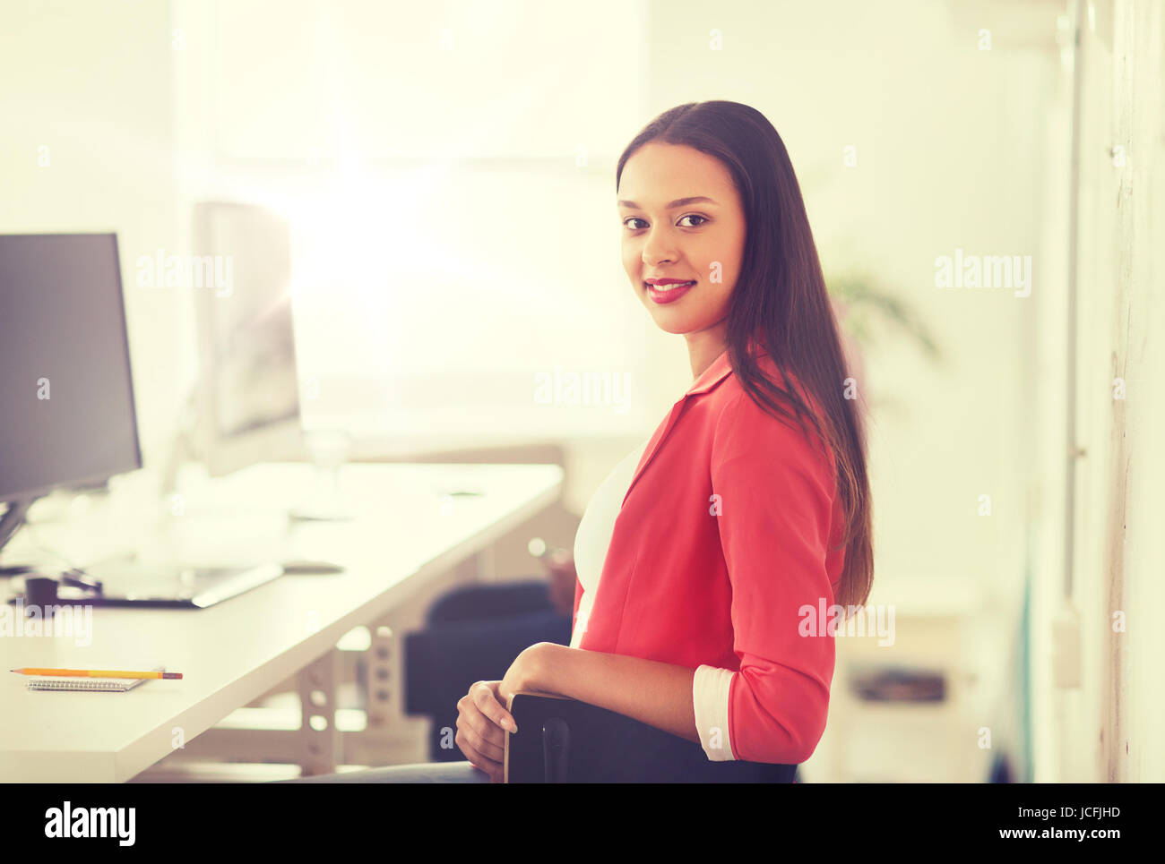 African woman at computer hi-res stock photography and images - Alamy