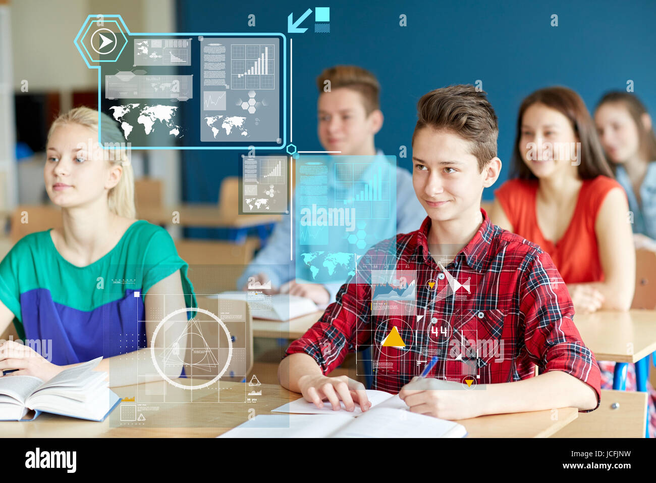 group of students with notebooks at school lesson Stock Photo