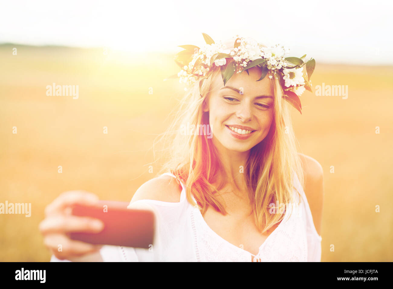 happy young woman taking selfie by smartphone Stock Photo - Alamy