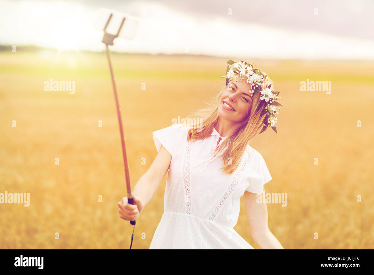 happy young woman taking selfie by smartphone Stock Photo - Alamy