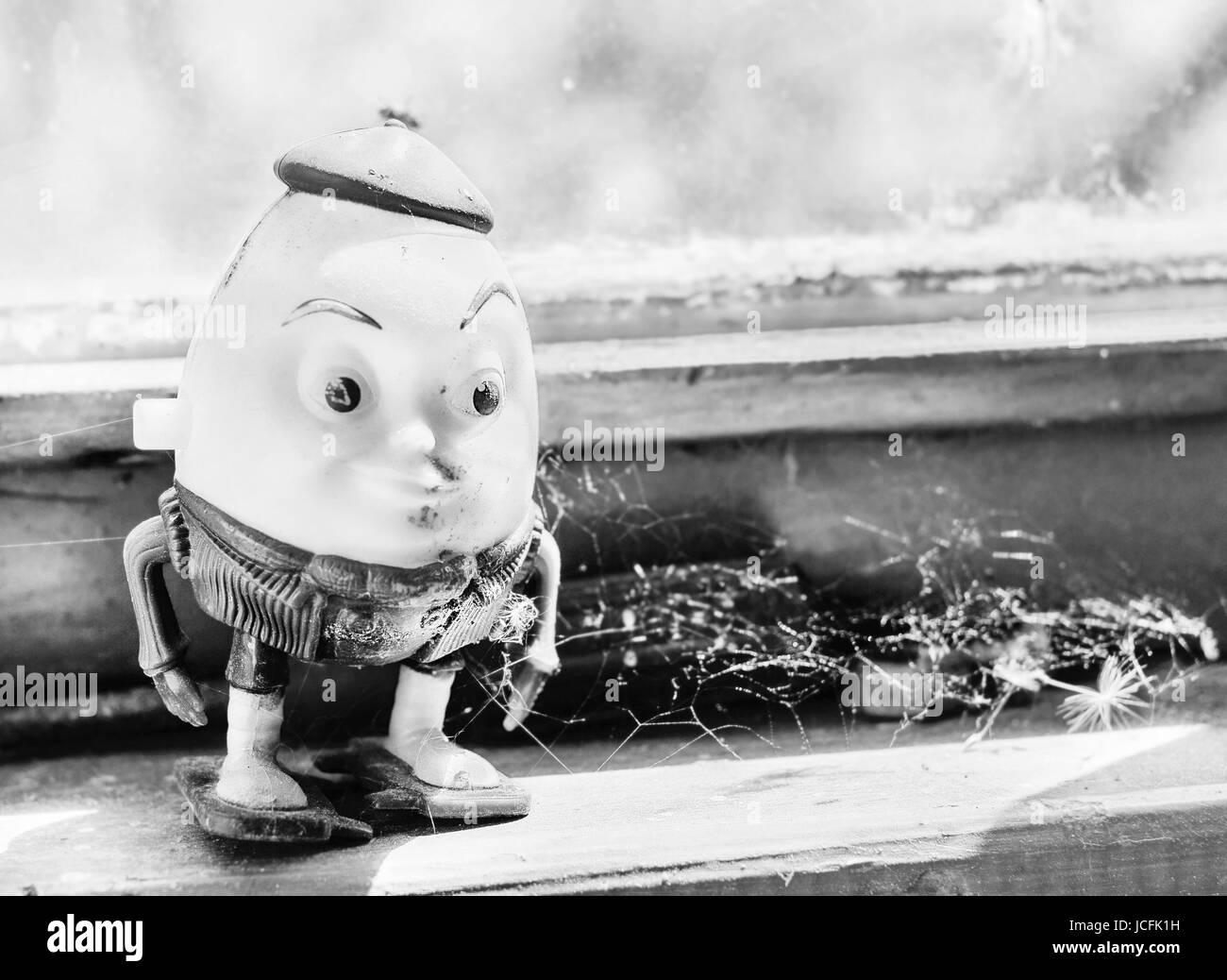 Humpty Dumpty toy old for editorial pictures in black and white Stock Photo