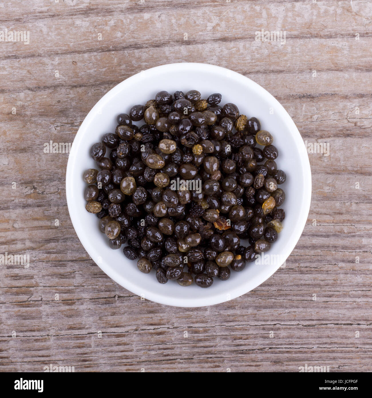 A Bowl of Papaya seeds Stock Photo Alamy
