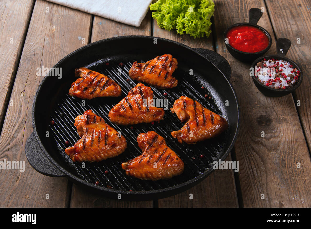 Fried chicken wings grill on grill pan Stock Photo Alamy