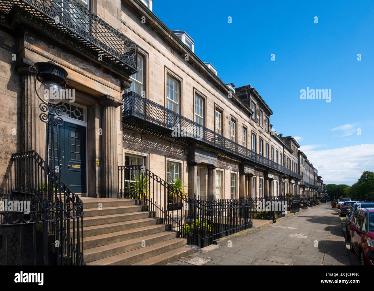 View of townhouses on historic Regent Terrace below Calton Hill in