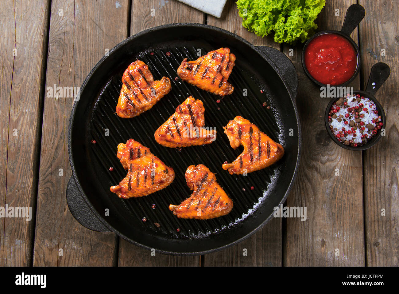 Fried chicken wings grill on grill pan Stock Photo Alamy