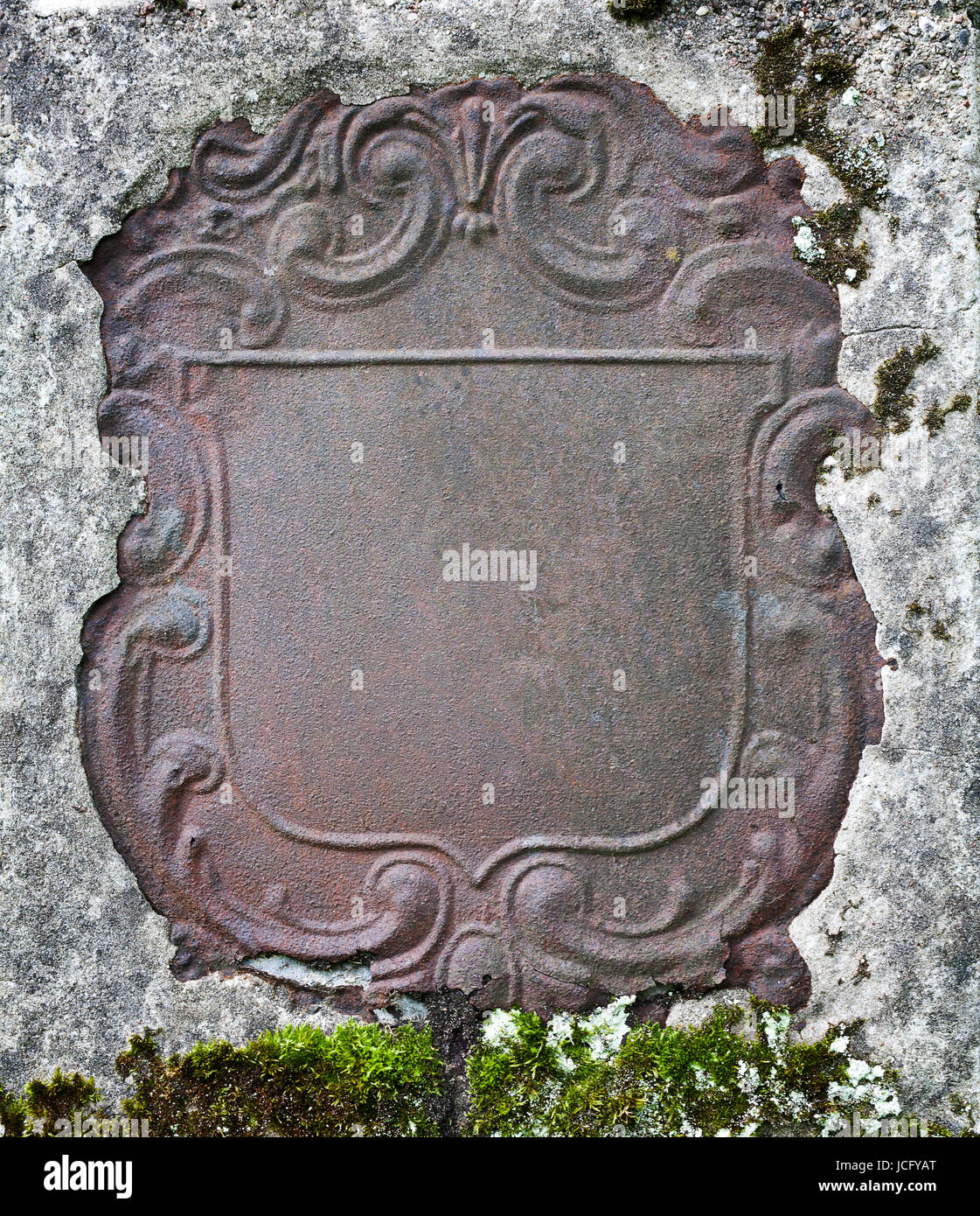 Rusty decorative metal plate in a wall Stock Photo Alamy
