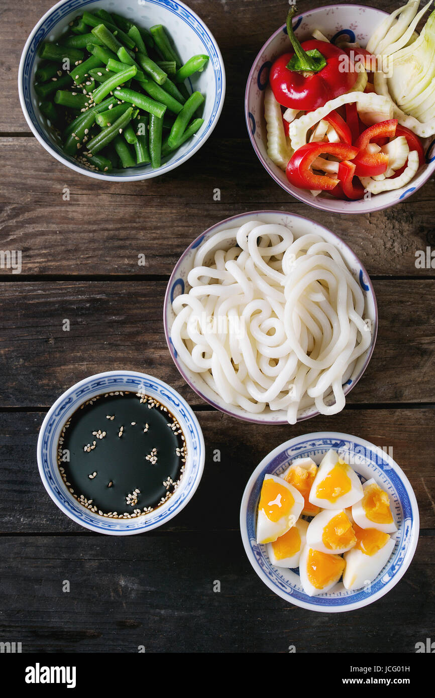 Ingredients for cooking stir fry udon noodles, green beans, sliced