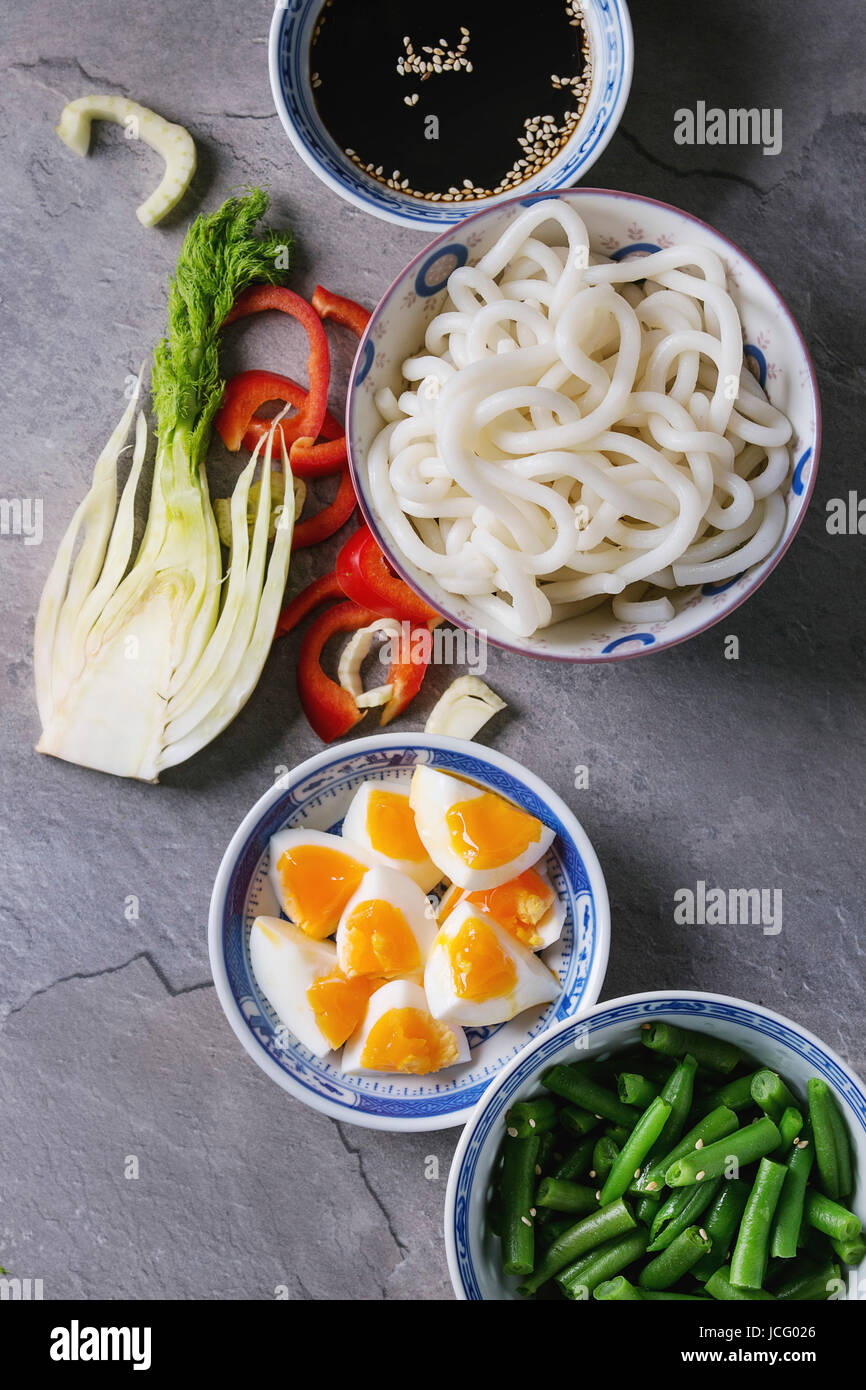 Ingredients for cooking stir fry udon noodles, green beans, sliced