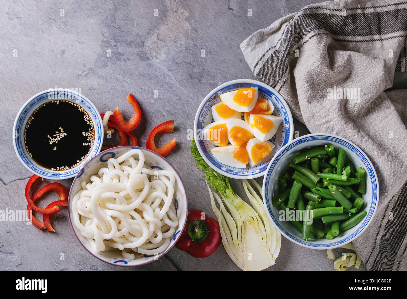 Ingredients for cooking stir fry udon noodles, green beans, sliced