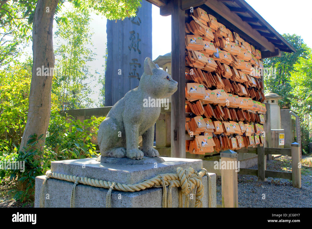 A Guardian Cat Komainu at Azusami-Tenjin-sha Shinto Shrine in Tachikawa city Tokyo Japan Stock Photo