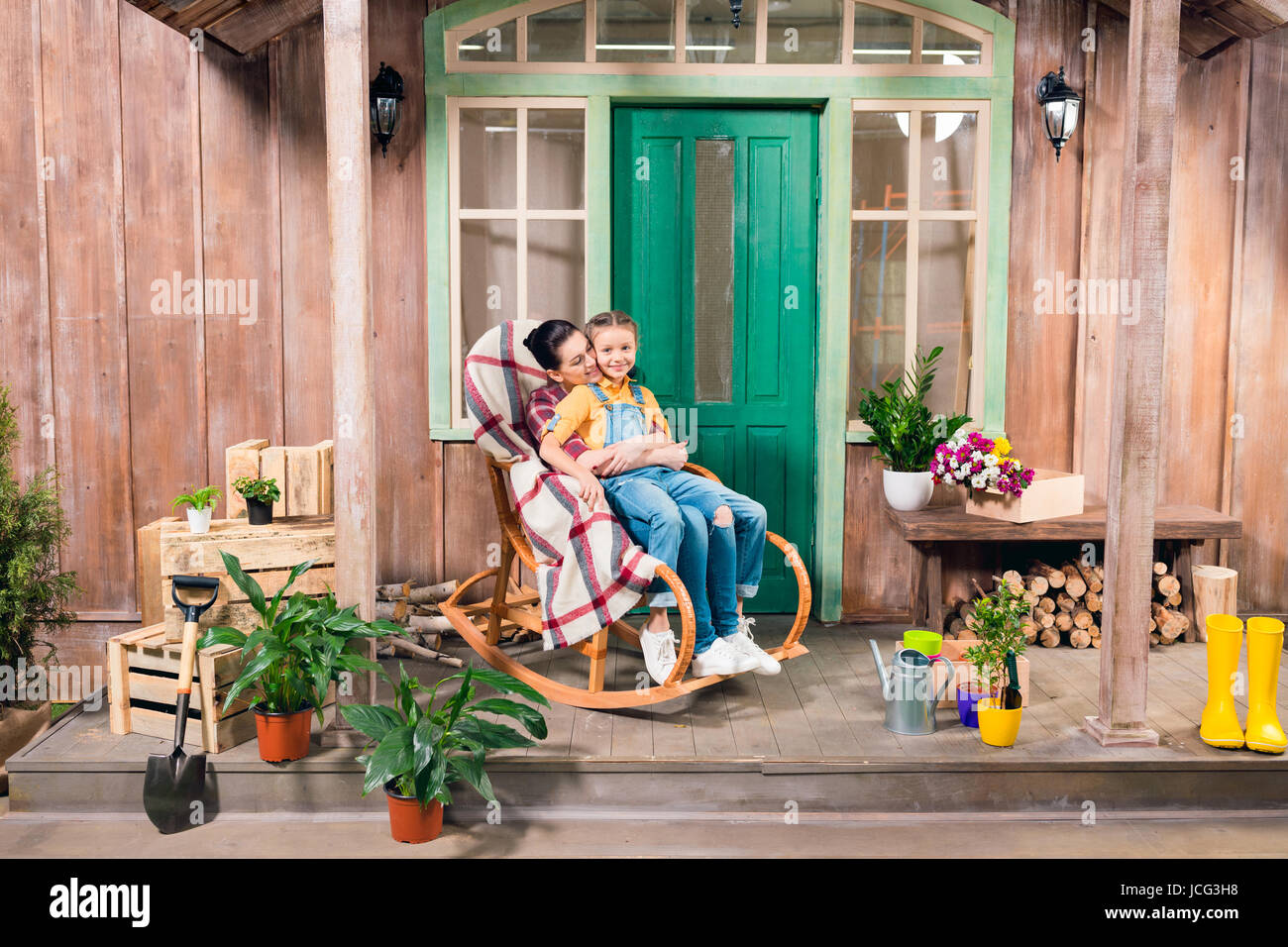 Girl sitting in rocking chair hires stock photography and images Alamy