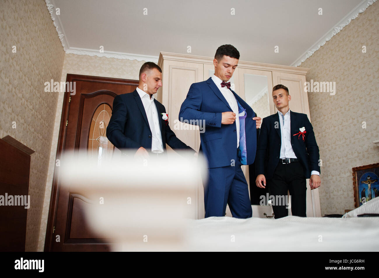 Awesome groom with his groomsmen having fun on a wedding day.a Stock Photo