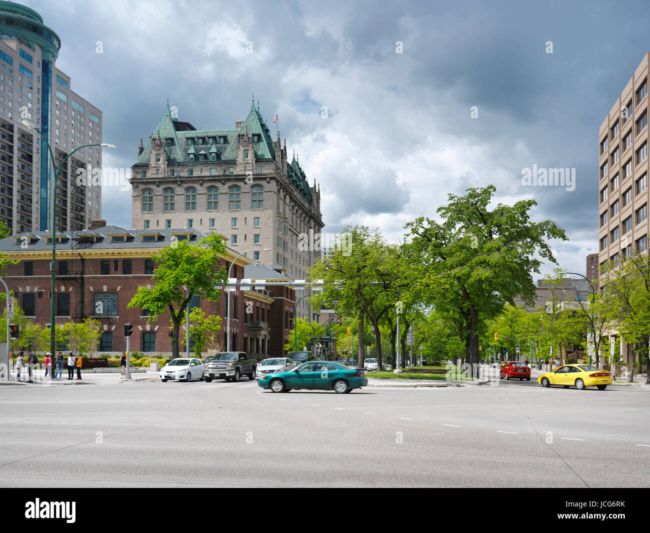 Winnipeg downtown city summertime scenery of cars on the Main street and Broadway intersection. Winnipeg, Manitoba, Canada 2017. Stock Photo
