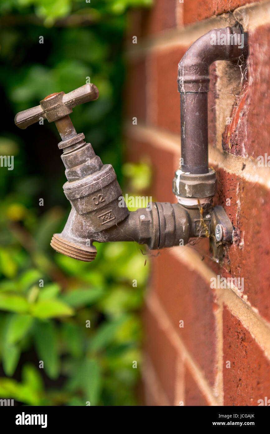 Wall mounted faucet hires stock photography and images Alamy