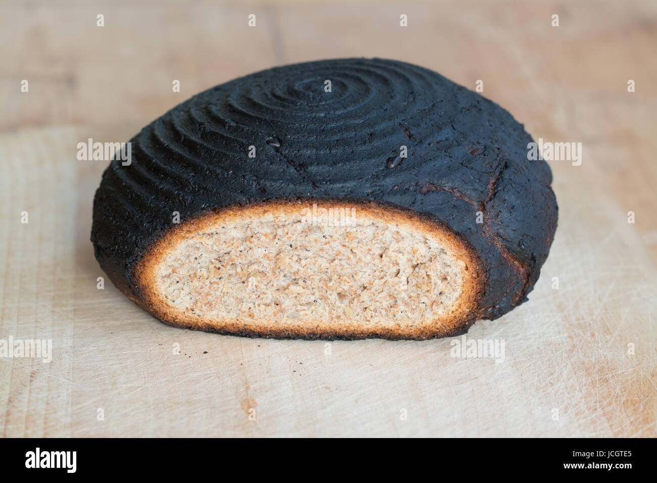 Burnt bread burnt homemade loaf of bread Stock Photo Alamy