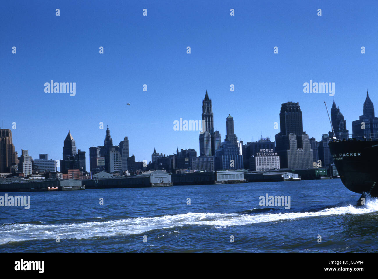 Antique October 1958 photograph, view of Downtown in New York City from the Hudson River, with the Woolworth Building at center. SOURCE: ORIGINAL 35mm TRANSPARENCY. Stock Photo
