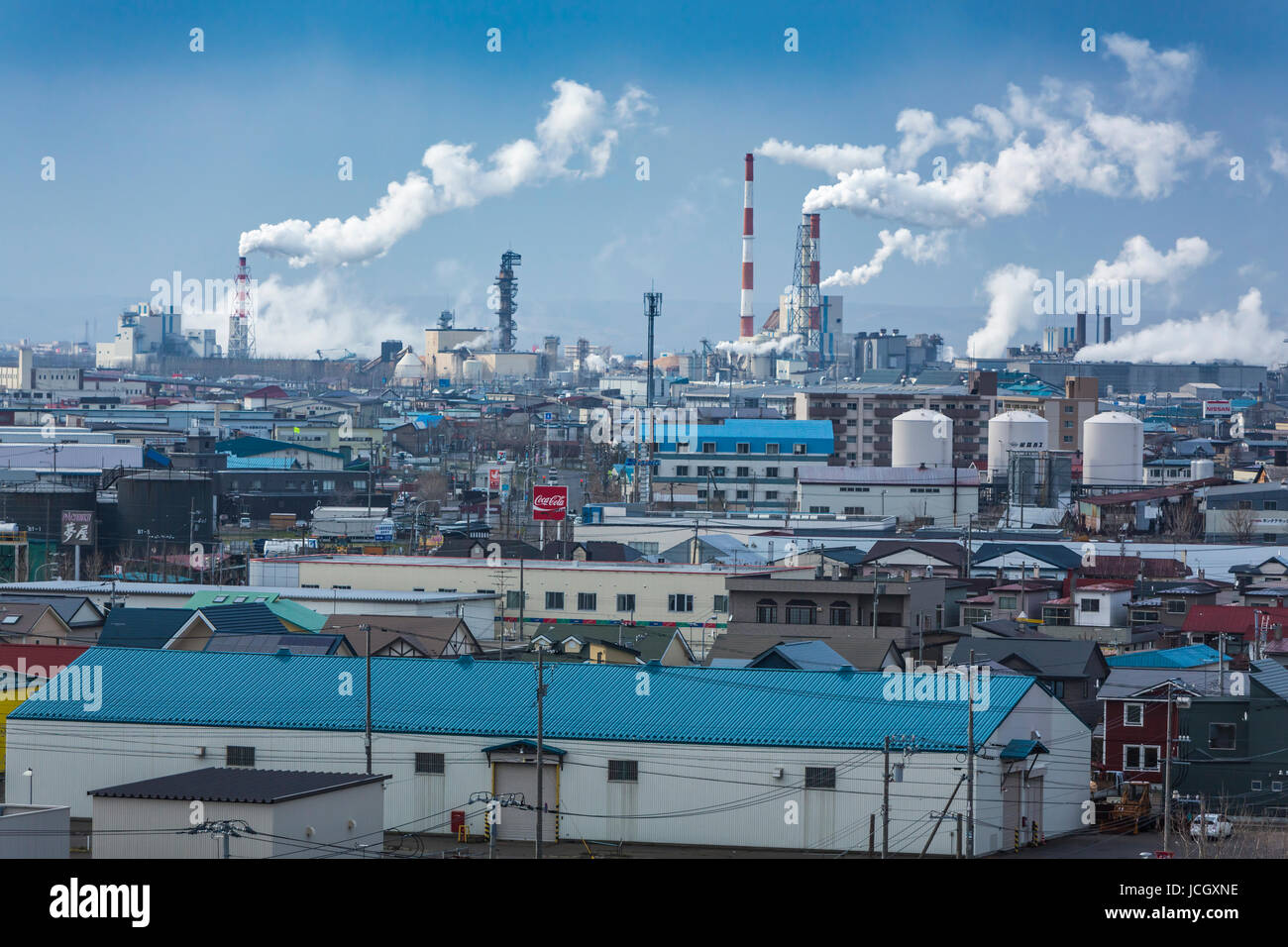 Smoke stacks and industrial installations in Kushiro, prefecture, Hokkaido, Japan. Stock Photo