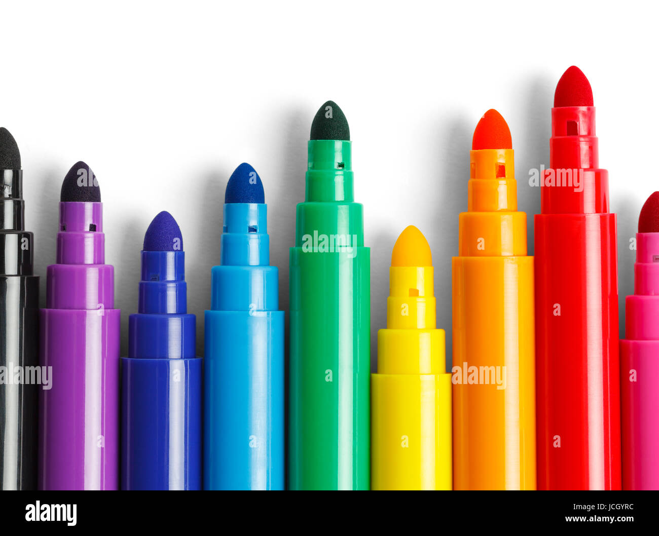Tops of Colored Markers Isolated on White Background. Stock Photo