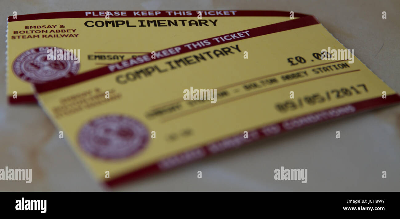 Embsay and Bolton Abbey Railway Tickets showing complementary zero fare on the table with foreground in soft focus Stock Photo