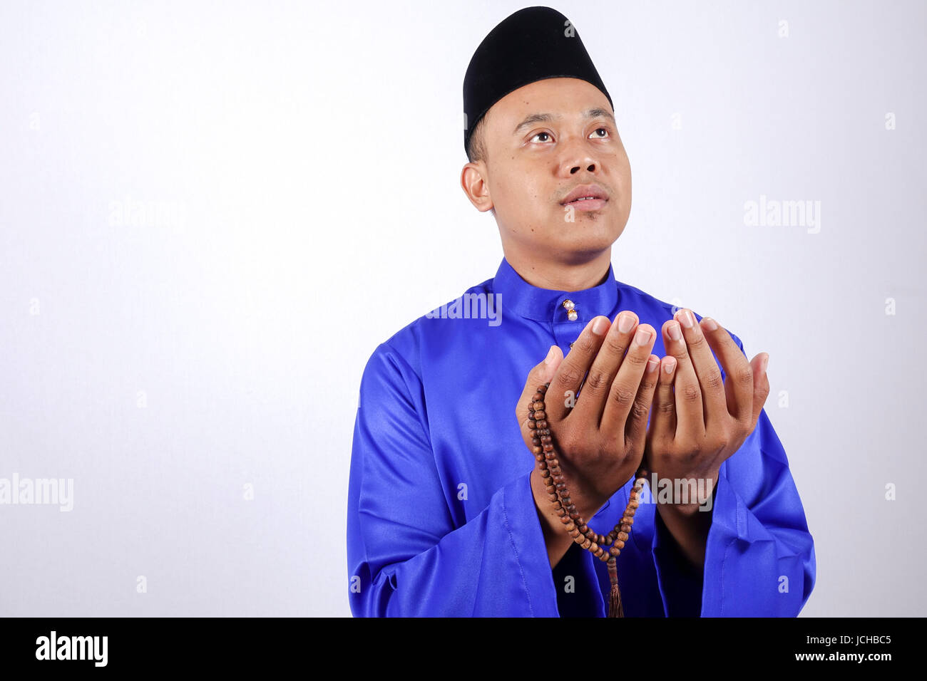 Muslim man praying hands black hi-res stock photography and images - Alamy