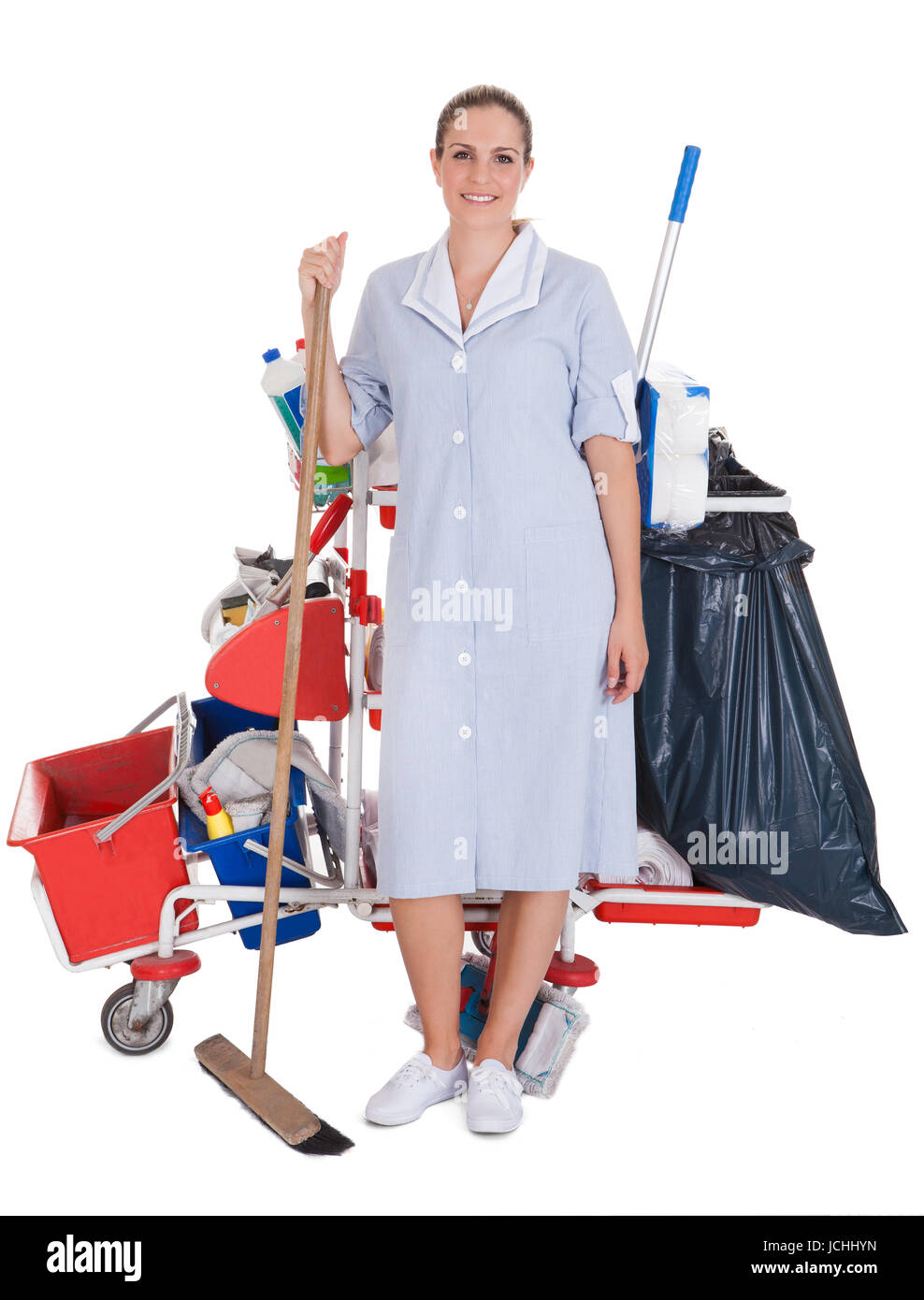 Female Cleaner With Cleaning Equipment Isolated On White Background Stock Photo