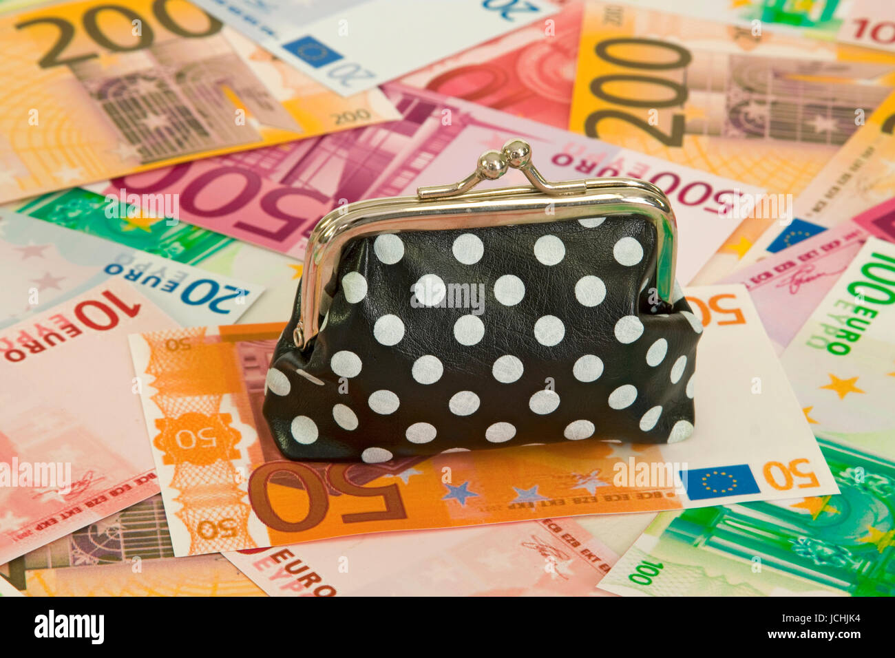 Purse with euro banknotes as background Stock Photo