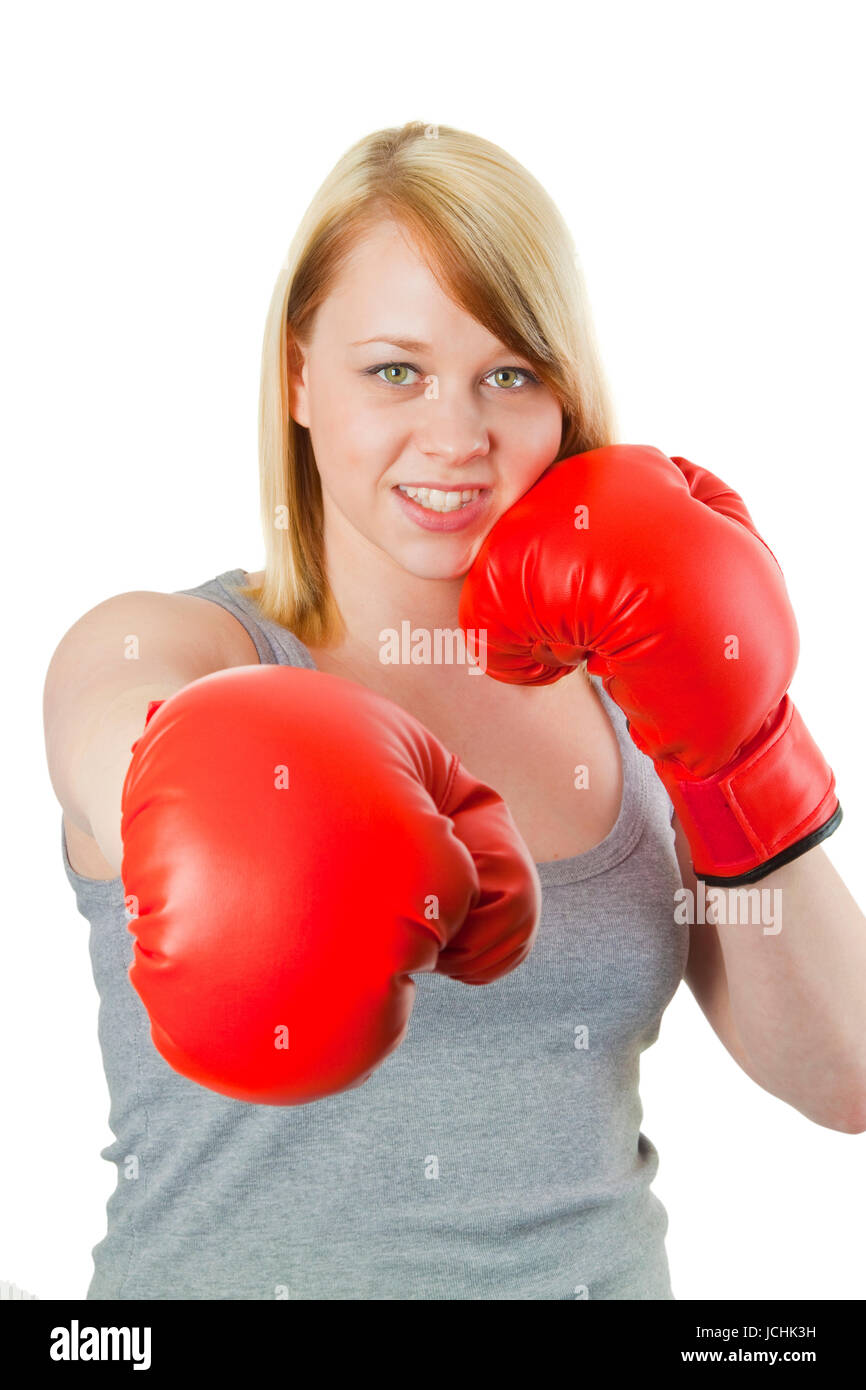 Young woman with red boxing gloves - isolated on white Stock Photo
