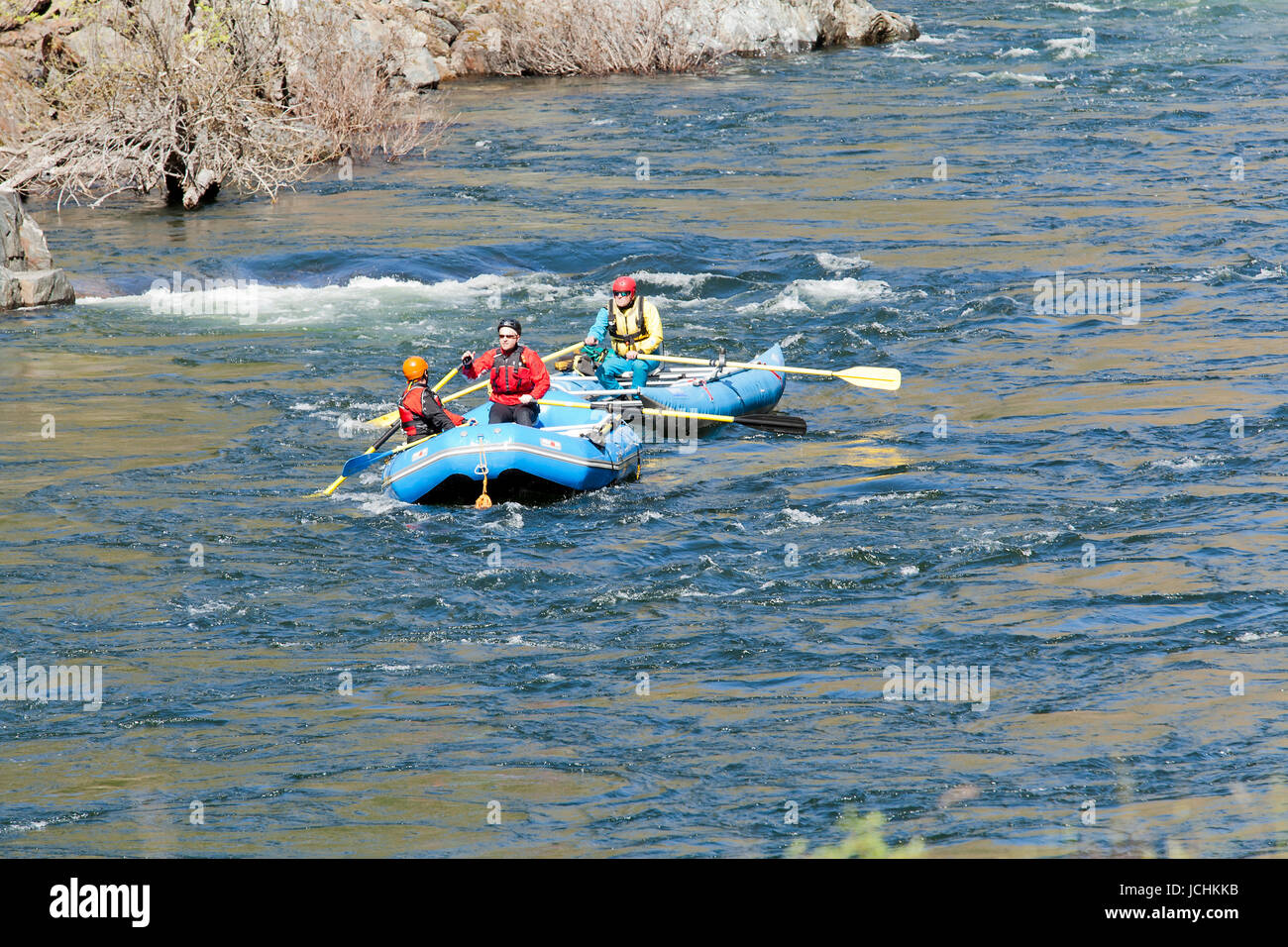 People river rafting on Kern river in inflatable boats - Kern River