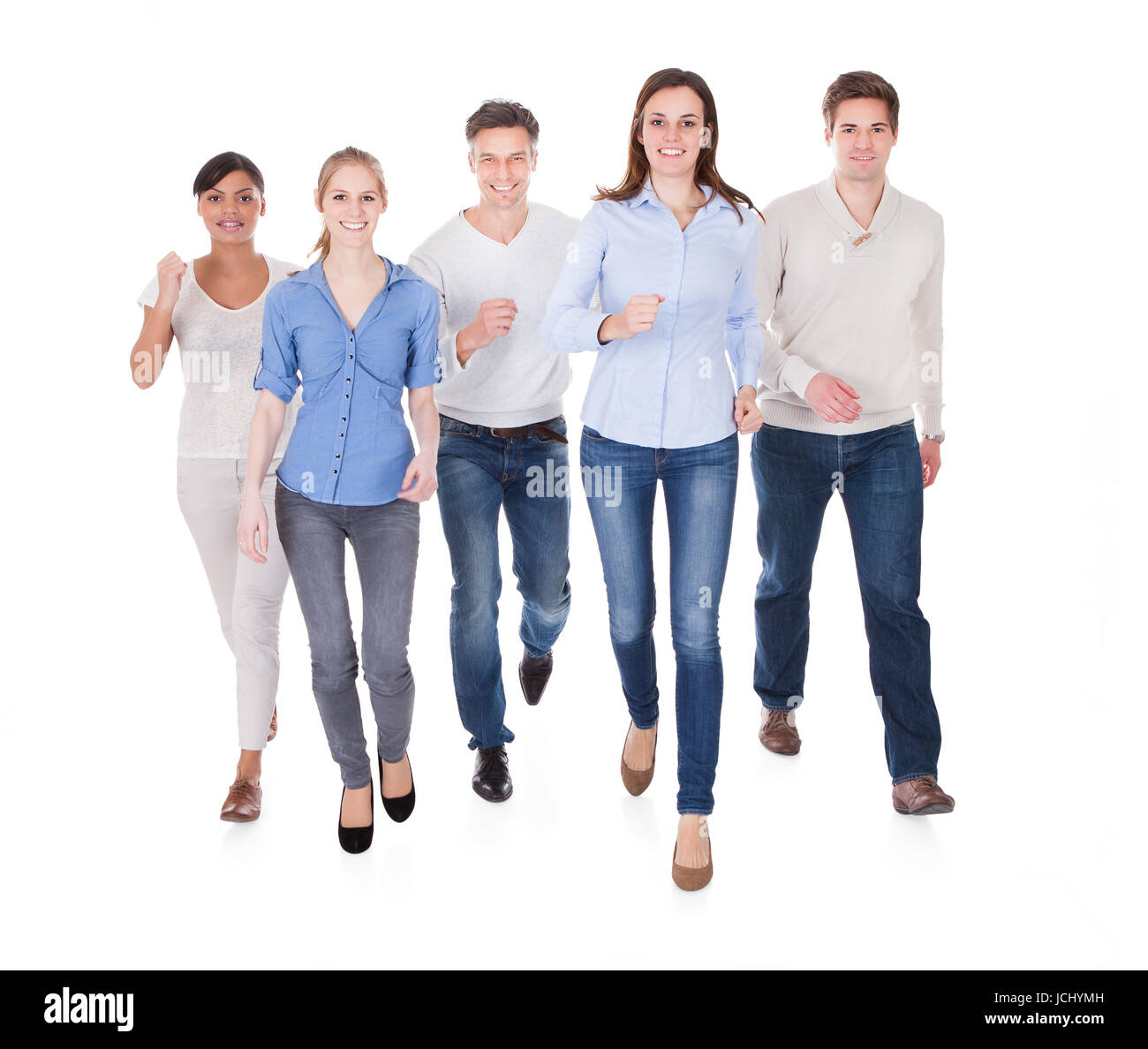 Group Of Happy People Walking Over White Background Stock Photo